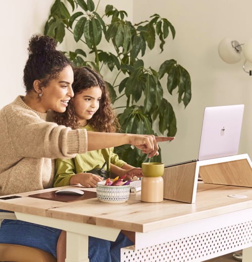 image of a mother and daughter opening a bankaccount